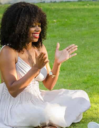 Sal Gregory celebrates being cancer-free with her son, Jalen, during a family photo session at Klyde Warren Park.