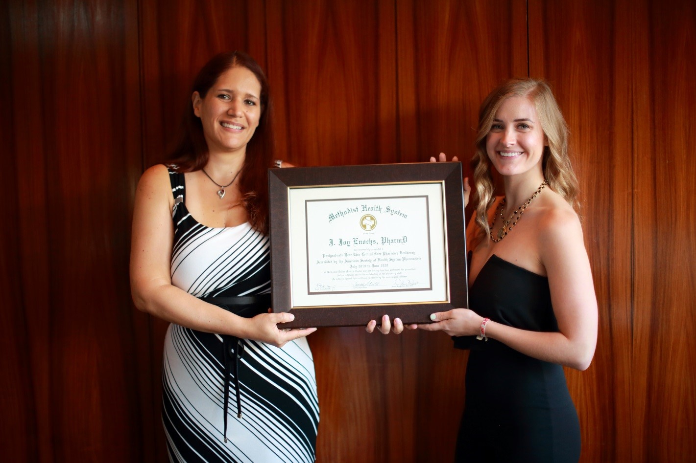 PGY2 Critical Care program director and resident at graduation