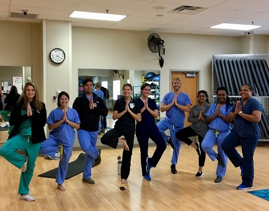 medical residents doing yoga