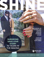 Spring 2021 Shine Magazine Cover featuring older couple holding hands holding a photos of them decades before
