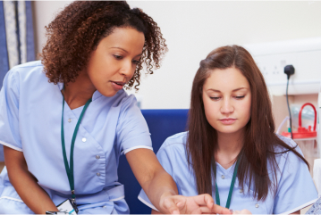 Two nurses talking