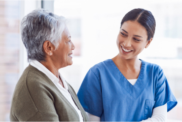Nurse smiling at patient