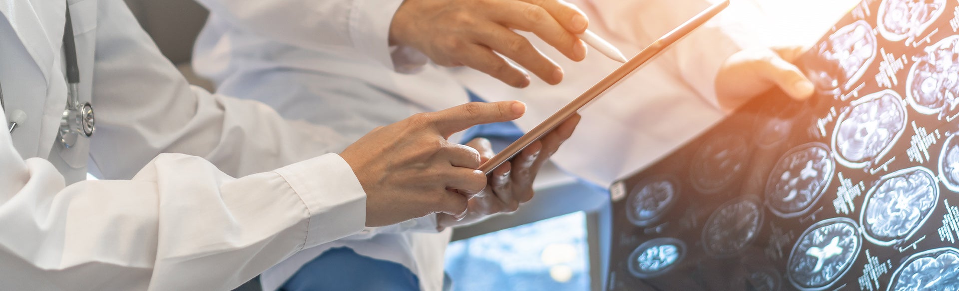 Doctors looking at x-rays