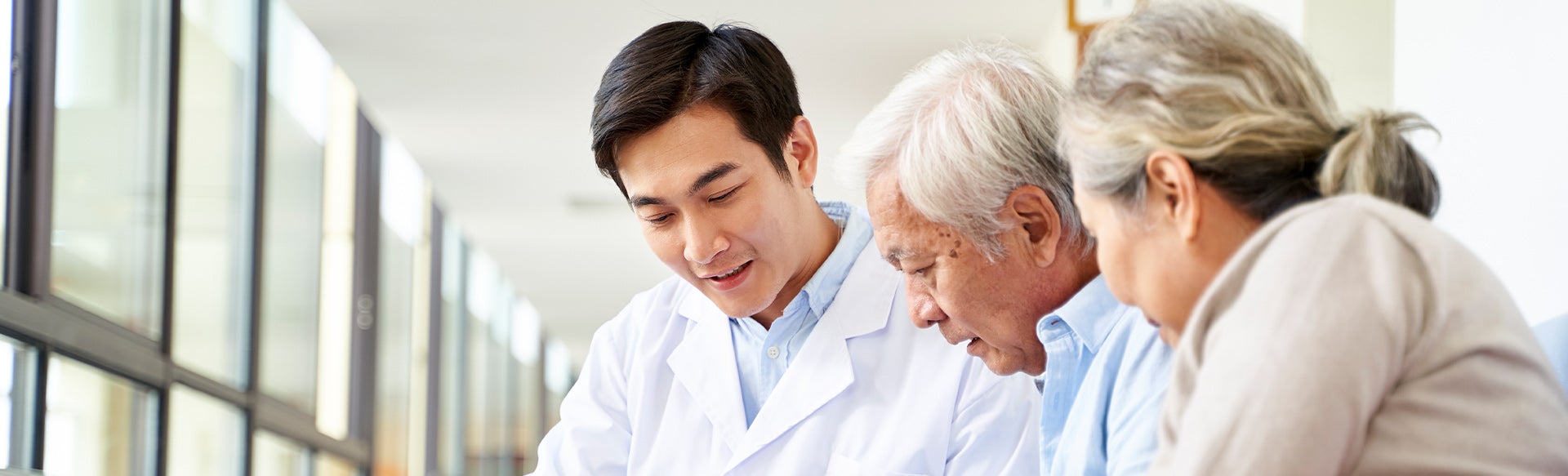 Doctor talking to patients
