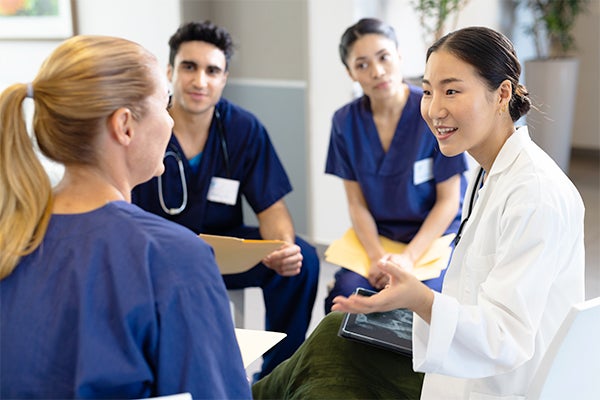Doctor talking to nurses