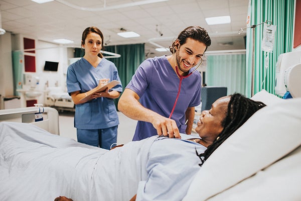 Nurses checking on patients