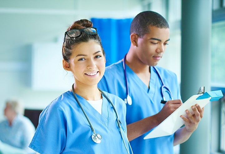 Female and male ER nurses