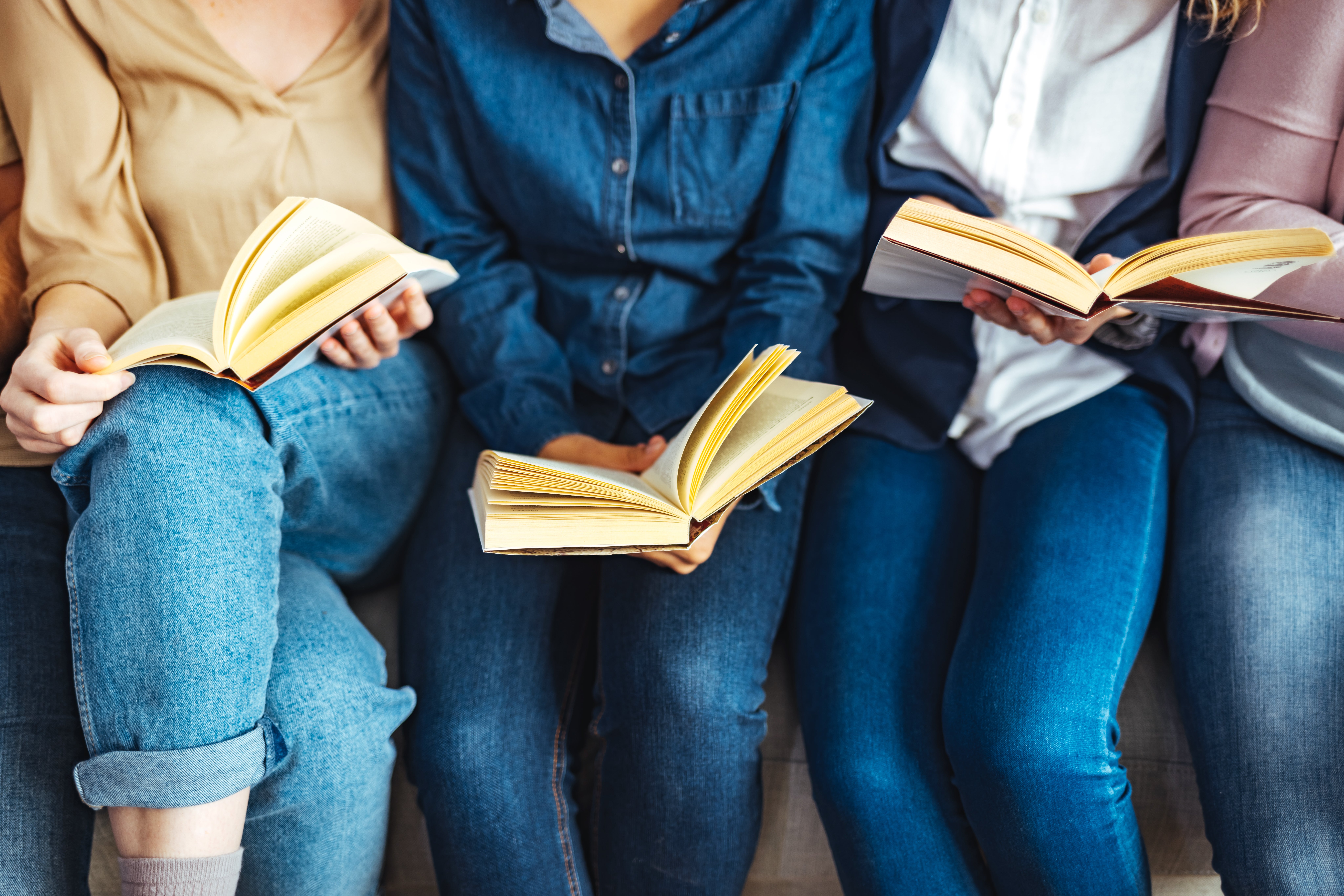 group of people reading books