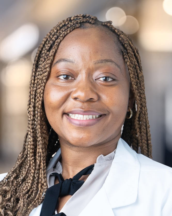  Lyne Etchouekang, MD